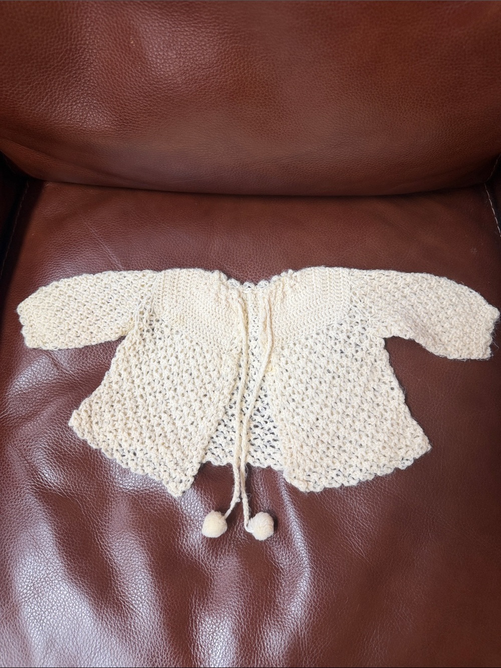 1950’s Cream Knit Open-Front Baby Sweater with Pom Tie